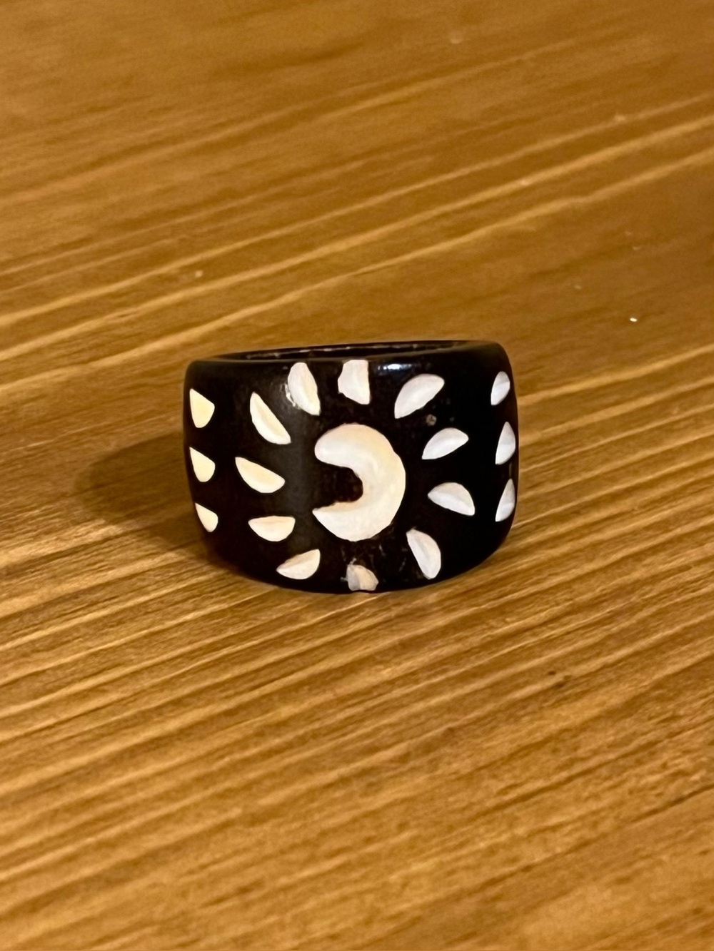 Wooden hand carved ring with moon design in center & rays goin round ring size 6